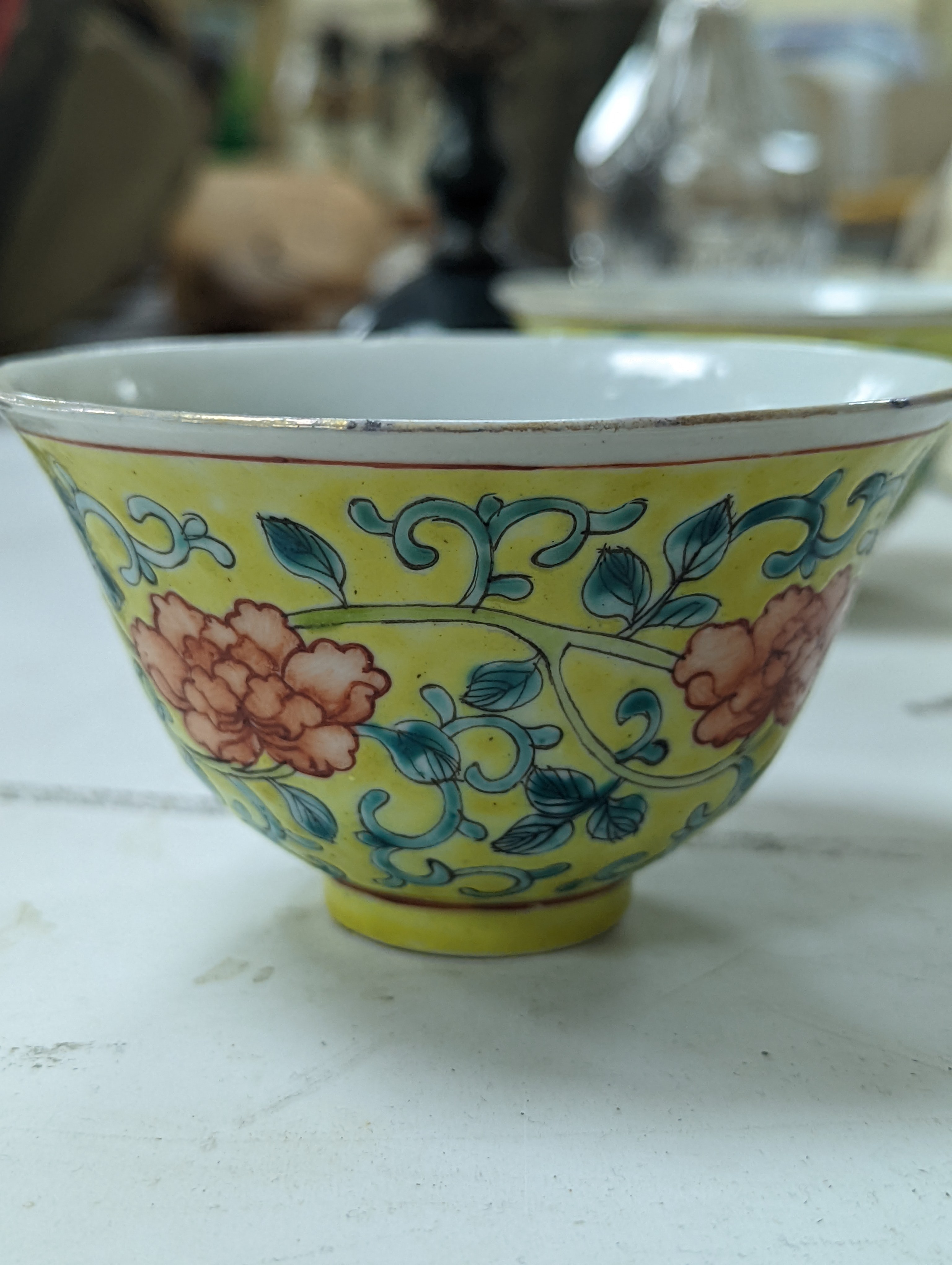 A group of Chinese porcelain, 19th /20th century, to include a pair of yellow ground bowls, 10.8 cm diameter, a blue and white vase, Xuande mark, a similar bowl and vase, and a champleve enamel bronze koro and cover